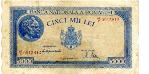 Romania
5000 lei
10 Oct 1944
Blue/Brown with scalloped edge
Front cachet with 2 male heads, Name of bank top, value & Royal Seal center, value in figures bottom corners
Rev Romania top center, with value then rural & comercial scene
Watermark BNR Banknote