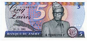 24.11.1985 
5 Zaires
Sig,Sambwa Mbagui
Blue/Red
President Mobutu
Hydro Electric Dam
Printer G&D
Security thread
Watermark Mobutu Banknote