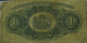 1942 1 dollar, bit discoloured with a small rip at the bottom Banknote