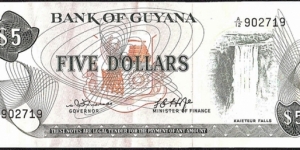 Guyana N.D. 5 Dollars.

Cut unevenly along the top.

2nd. '9' in top serial number inconpletely printed. Banknote