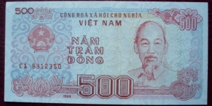 Ngân Hàng Nhà Nước Việt Nam |
500 Đồng |

Obverse: Hồ Chí Minh and Coat of Arms |
Reverse: Dockside boat |
Watermark: Big flowers Banknote