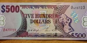 Guyana |
500 Dollars, 2002 |

Obverse: Coat of Arms and Map of Guyana |
Reverse: Guyana Parliament building |
Watermark: Head of a Macaw parrot Banknote