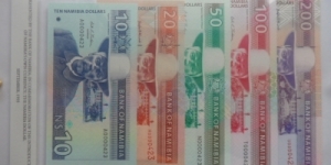 Set of Namibian Dollars – Same Serial number.
Uncirculated notes – Two notes were handled by bank personnel (not damaged)
Denominations of 10, 50 and 100 were introduced in 1993.
Denominations of 20 and 200 were only introduced in 1996. (Therefore the “difference” in format of serial number)

For Trade of notes/coins Banknote