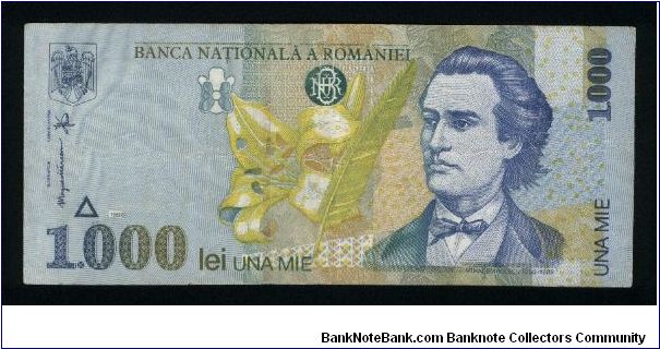 1000 Lei.

Mihai Eminescu, lily flower and quill pen on face; lime and blue flowres on center, and ruins of ancient fort of Histria on back.

Pick #106 Banknote