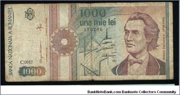 1000 Lei.

Circular shield at left (September 1991).

Mihai Eminescu and sails of sailing ship on face; Putna monastery on back.

Pick #101a Banknote
