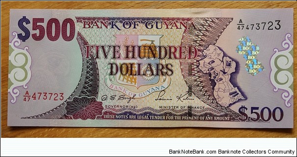 Guyana |
500 Dollars, 2002 |

Obverse: Coat of Arms and Map of Guyana |
Reverse: Guyana Parliament building |
Watermark: Head of a Macaw parrot Banknote