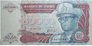 50,000 Zaires. Gorilla picking nose on reverse. Banknote