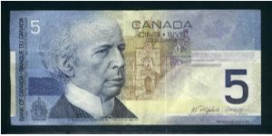 5 Dollars.

Sir Wilfrid Laurier and west block of Parliament on face; winter sports (children skating, tobogganing, playing hockey) on back.

Pick #101 Banknote