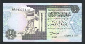 1/2 Dinar.

Oil refinery at left center on face; irrigation system at left center on back.

Pick #58b Banknote