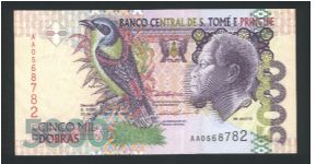 5000 Dobras.

Rei Amador at right, Papa Figo bird at left center on face; Esplanade, modern building at left center on back.

Pick #65a Banknote
