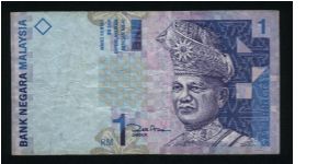 1 Ringgit.

Yang-Di Pertuan Agong, First Head of State of Mlalaysia (died 1960) on face; flora and mountain landscape with lake on back.

Pick #39 Banknote
