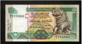10 Rupees.

Sinhalese Chinze at right on face; painted stork at top left, Presidential Secretariat building in Colombo, flowers in lower foreground on back.

Pick #102 Banknote