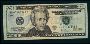 20 Dollars.

Series 2004 G7.

Enhanced security feactures; multicolor underprintings and optical variable ink figures.

Portrait A. Jackson at center on face; the White House on back.

Pick #519 Banknote