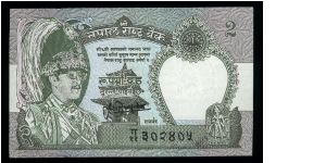 2 Rupees.

King Birendra Bir Bikram wearing plumed crown at left, temple at center on face; leopard at center on back.

Pick #29a Banknote