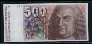 500 Franken.

Format: 181x82mm

Albrecht von Haller at right and mountains (Gemmi Pass) at left on face; anatomical muscles of the back, schematic blood circulation and a purple orchid flower on vertical format on back.


Pick #58c Banknote