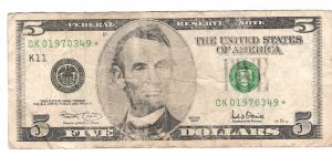 2001 Star $5.00 US
pretty Raged Banknote