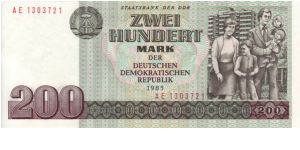 East Germany, 200 Marks note dating from 1985 showing a family & then modern Tower Block Banknote