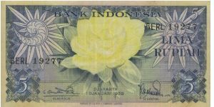 Dated 1st January 1959 Flowers Series. 

5 Rupiah,
Signed By Loekman Hakim & TRB Sabaroedin 

OBVERSE:A Flower 

REVERSE:Birds 

Printed & Engraved By:
Thomas De La Rue & Company Limited,London

Watermark Indonesia Arms Garuda Pancasila. 

Size:125x65mm Banknote