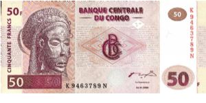 Wooden mask on front; Fishing village on back Banknote