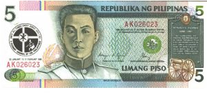 Like #168 but with black commemorative design and date in watermark area.

Deep green and brown on multicolour underrpint. Aguinaldo at left center and as watermark, plaque with cannon at rigth Aguinaldo's Independence Declaration of June 12, 1898 on back.

Red serial #. 

Signature 12. Banknote