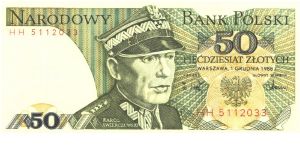 Olive-green on multicolour underprint. K. Swierczewski at center. Order of Grunwald at left on back. Banknote