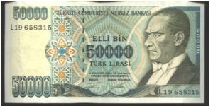 Blue-green and dark green on multicolour underprint. National Parliament House in Ankara at left center on back. Banknote
