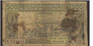 Design like #105A

Lilac, light olve-green and multicolour. Artwork at left, long horn animals at center, man wearing hat at right. Cultivated palm at left, aerial view at center, mask at right on back. Banknote