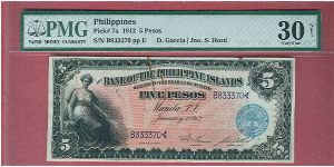 Five Pesos Bank of the Philippine Islands P-7a graded by PMG as VF-30. It has rust stains but still a nice note. Banknote