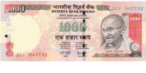 India

Denomination: 1000 Rupees (Type Dated)
Watermark: Mahatma Gandhi.
Dimensions: 177 × 73 mm.
Main Colour: Red and Pink.

Obverse: Mahatma Gandhi.
Reverse: Economy of India. Banknote