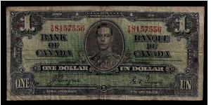 Bank of Canada One Dollar note Ottawa 8 Jan 1937 # T/M 8157556. In heavily circulated 'low grade' condition with several folds, marks and a few reddish spots. One vertical and one horizontal crease. Signed Coyne and Towers. Banknote