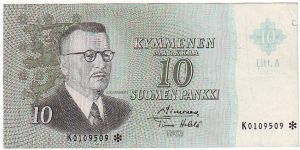 10 Markkaa Litt.A Serie K

Banknote size 141 X 69mm (inch 5,55 X 2,72)
	
The replacement of banknotes (asterisk)

This note is made of 1970 Banknote