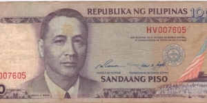 Philippine 100 Pesos note with red serial number. Banknote