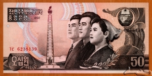 North Korea | 
50 Wŏn, 1992 | 

Obverse: Tower of the Juche Idea in Pyongyang, In front of the tower is a 30 metre high statue consisting of three figures - one with a hammer, one with a sickle and one with a writing brush (an idealised worker, a peasant and a working intellectual), and Young industry professionals | 
Reverse: Fir trees with Mt. Paekdu, and Baekdudaegan mountain range in the background | 
Watermark: Torch of Juche Ideology Tower | Banknote