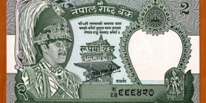 Nepal | 
2 Rupees, 1985 | 

Obverse: King Bīrendra Bīr Bikram Shāh wearing a plumed crown, Bajrayogini Temple (Gunbaha dyega) near Sankhu and Kathmandu, Old coin design, and Frieze (stone carving) with female deity on it | 
Reverse: Leopard, and National Coat of Arms | 
Watermark: Plumed crown | Banknote
