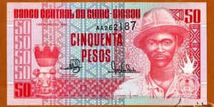 Guinea-Bissau | 
50 Pesos, 1990 | 

Obverse: Pansau Na Isna | 
Reverse: Villagers | 
Watermark: BCG | Banknote