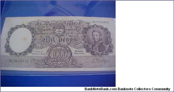 1.000 pesos moneda nacional
Serial C
16.703.571
Signs Fábregas - Méndez Delfino Banknote