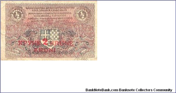 2 Koruny
Kingdom SHS
over print on 1/2 Dinar note Banknote