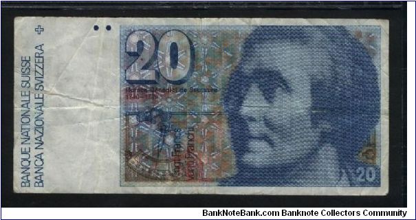 20 Franken.

Format: 70x148 mm

Horace-Bénédict de Saussure (1740-1799; geologist) at right, hygrometer at left on face; fossel and early mountain expedition team hiking in the Alps on back.

Pick #55b Banknote