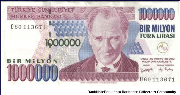 Turkey 2002 1,000,000 lira. 
I believe it's the 4th series. E 7 - BIR MILYON TÜRK LIRASI ÜÇÜNCÜ TERTIP 

Great, I'm a millionaire!!! Except I remembered that when I changed 1USD, it was 1USD to 1.2 million Turkish lira. Everyone WAS a millionaire in Turkey... Banknote