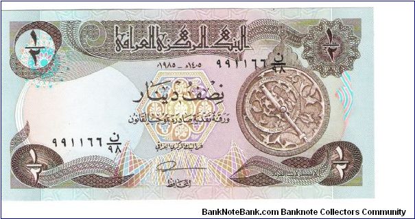 1/2 Dinar from Iraq  Set#2 i think Dated around 2003/2004

*Nice serial Number* Banknote