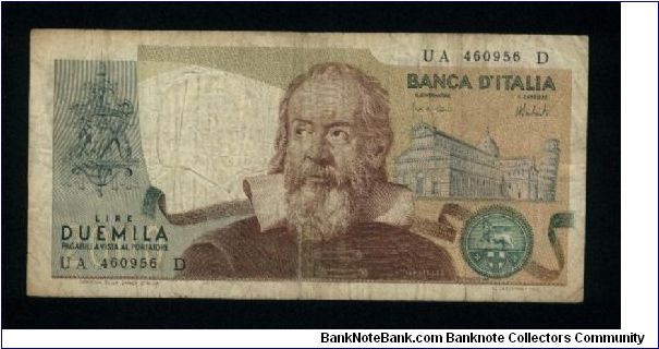 2,000 Lire.

Galileo at center, ornate arms at left, buildings and leaning tower of Pisa at right; signs of the Zodiac on back.

Pick #103a Banknote