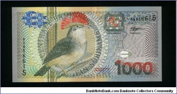 1,000 Gulden.

Royal Flycatcher at left center on face; Orchidaceae Violacea flower on back.

Pick #151 Banknote