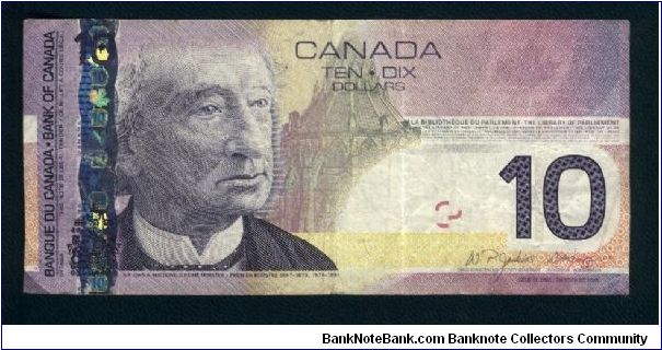 10 Dollars.

Enhanced security feactures.

Sir John A. Macdonald and Parliament Library on face; veteran and children at memorial at right, peacekeeper with binoculars at center, poppies, doves and the first verse of In Flanders Fields at right on back.

Pick #NEW Banknote