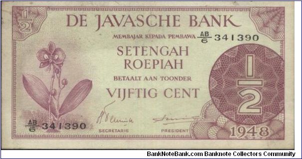 DE JAVASCHE BANK 1/2 ROEPIAH 1948. SIGNED BY H.TEUNISSEN & DR.R.E.SMITS. (O)MOON ORCHID (R)2 LANGUAGE-LAW TEXTS WITH A SERIES NO:341390. 124X64MM Banknote