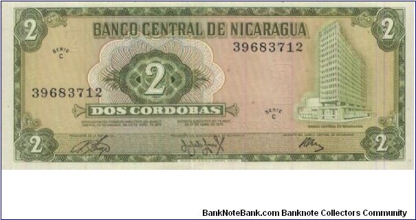 1 Cordobas Dated 27 April 1972.(O)Banco Central De Nicaragua Building(R)Sembradio De Algodon.Printed By Thomas De La Rue & Company Limited,London. Banknote