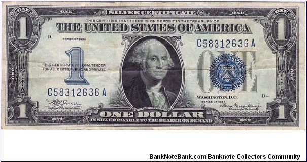 1934 Silver Certificate. This note has the same funny back but the Obverse has changed somewhat from the 1928. Nice Vf. Banknote