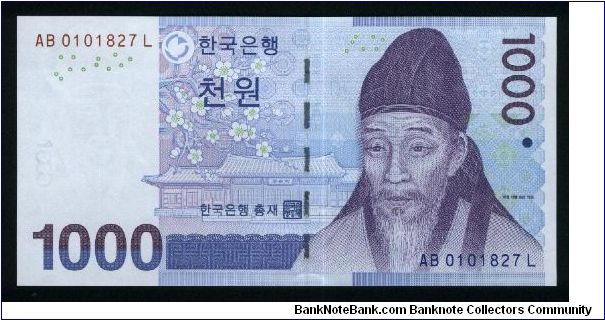 1,000 Won.

Reduced Sizes.

Yi Hwang at right on face; old traditional drawing at center on back.

Pick #NEW Banknote