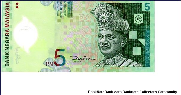 Malaysia Polymer
5 Ringgit 2004 
Green/Purple
Governor Z A Aziz 
Front See through window showing Prime Minister's office at Putrajaya, Hibiscus National flower Top & Bottom, 1st King of Malaysia, Seri Paduka Baginda Yang di-Pertuan Agong
Rev landmark buildings, the KL International Airport, the Petronas Twin Towers, and a map showing Putrajaya and Cyberjava. Banknote
