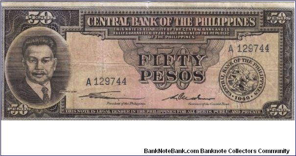 PI-138a Super RARE English Series 50 Pesos note with Quirino / Cuaderno signatures. Banknote