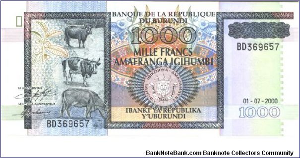 Greenish black and brown-violet on multicolour underprint. Cattle at left, arms at lower center Monument at center on back. Signature titles: LE GOUVERNEUR and LE 1ER VICE-GOUVERNEUR. Watermark: President Micombero. Banknote